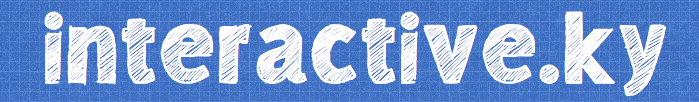 The interactive.ky logo — hand-drawn white lettering on blue graph paper