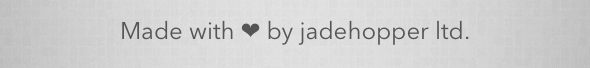 The same footer text with the heart rendered as a plain black glyph